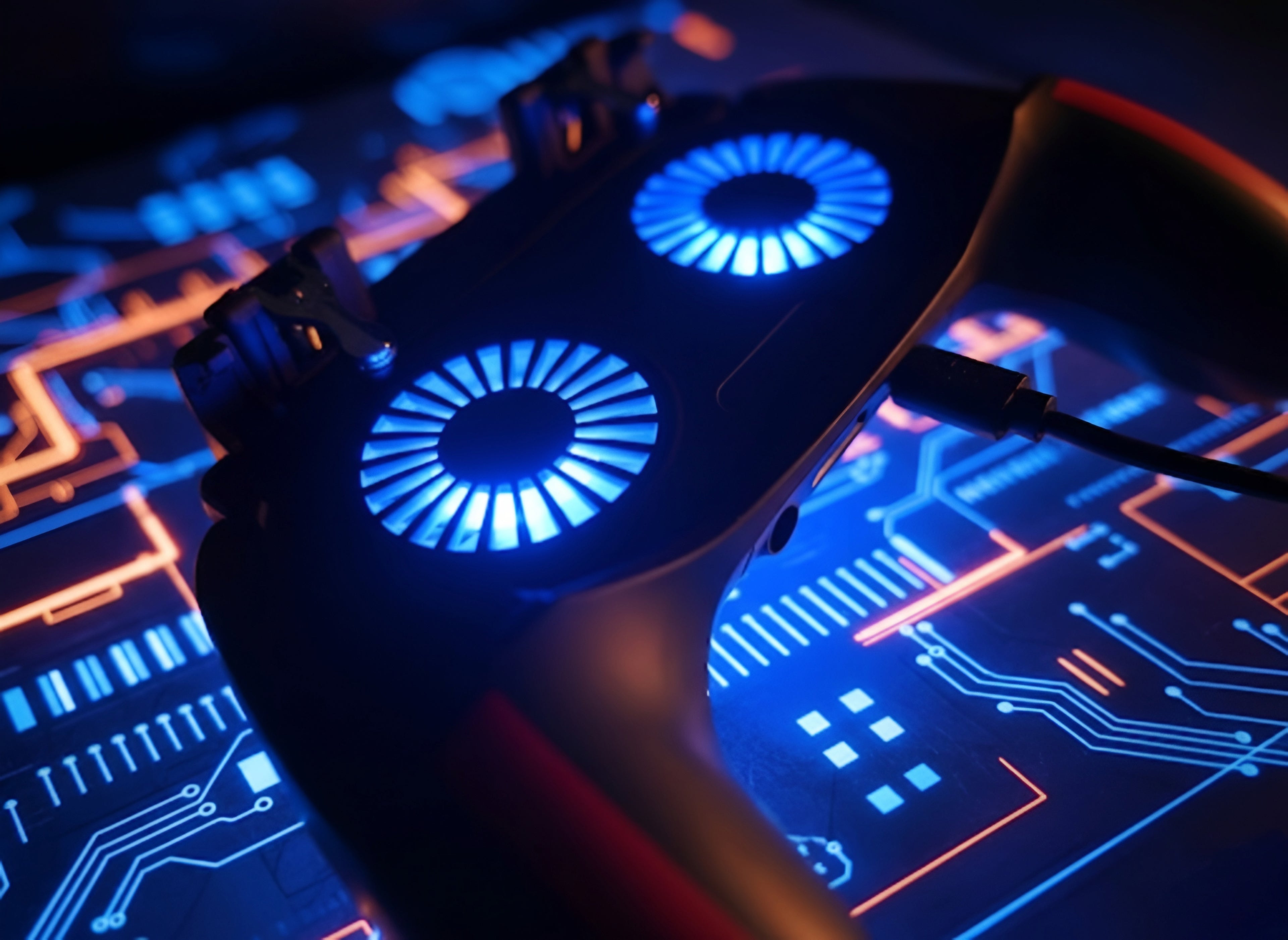 The Oros Vibes Glacier Dual-Fan Grip | 3-in-1 Controller, Cooler, and Power-Booster